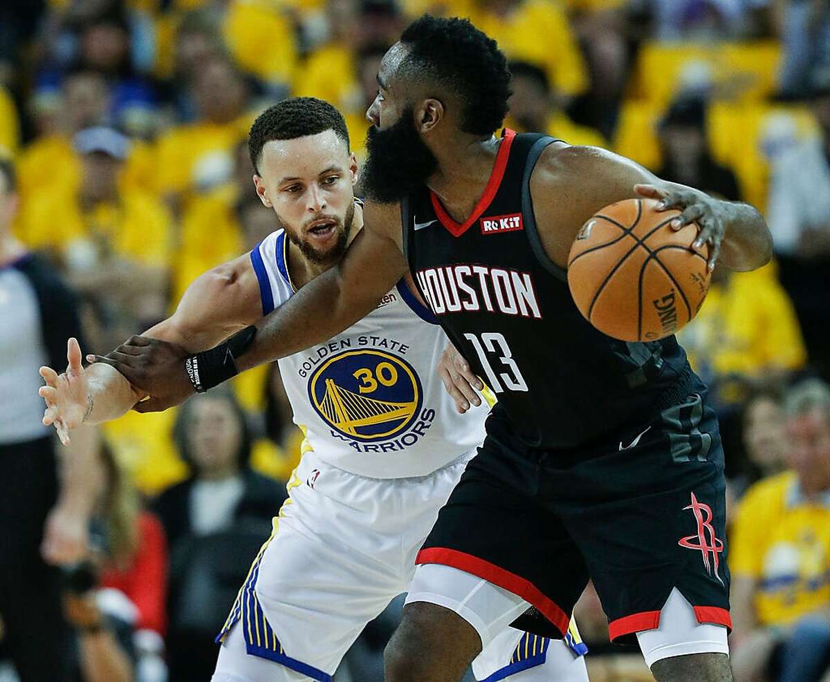 Golden State Warriors Stephen Curry guards Houston Rockets James Harden in the second quarter during game 1 of the Western Conference Semifinals between the Golden State Warriors and the Houston Rockets at Oracle Arena on Sunday, April 28, 2019 in Oakland, Calif.
