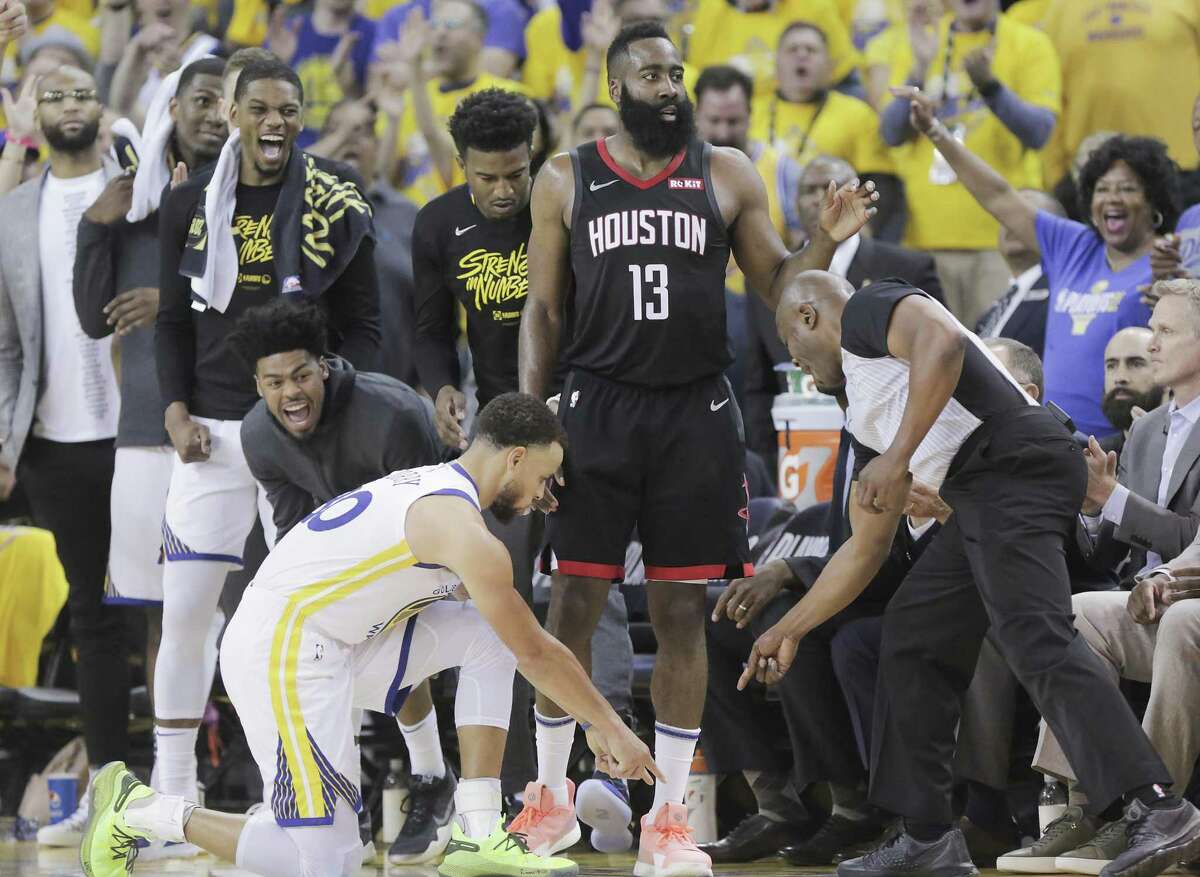 PHOTOS: A look back at the Rockets' Game 1 loss in Oakland Golden State Warriors guard Stephen Curry (30) points to where Houston Rockets guard James Harden (13) stepped out of bounds in the second half of Game 1 of the NBA playoffs at the Oracle Arena on Sunday, April 28, 2019 in Oakland. The NBA's two-minute report Monday rules that Curry should have been called for a foul on the play.