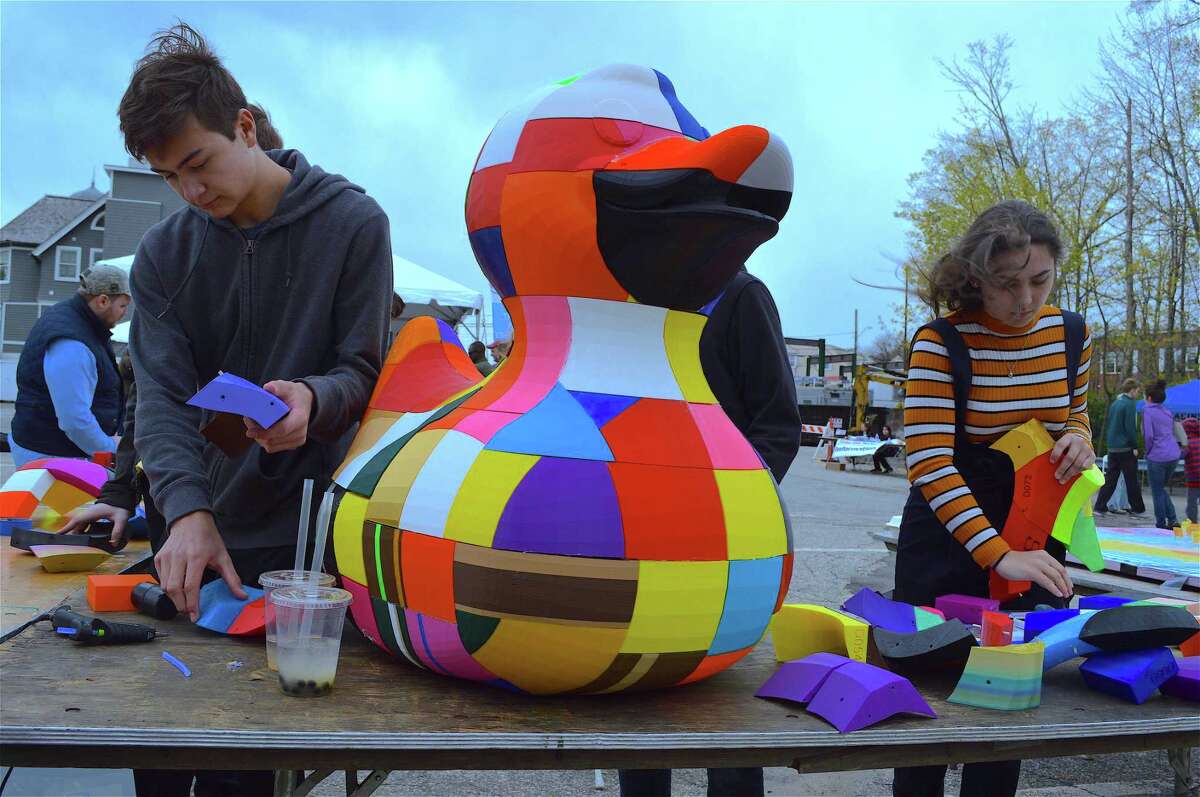Staples High School students Henry Schwabe, 15, and Samantha Taylor, 16, work on assembling a duck at the Maker Faire Westport on Saturday, April 27, 2019, in Westport, Conn.