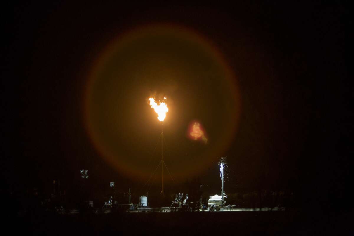 A flare is seen off I-10 near Balmorhea, Texas on March 27, 2017. Flaring has come to the fore as one of the worst side effects of the shale boom in Texas as vast amounts of gas from oil wells in the Permian Basin are being burnt off for lack of pipelines to ship it away. While pressure mounts to curb the practice, a supply glut, depressed U.S. gas prices and the distance from key markets for the heating fuel means the byproduct of crude production has little value for explorers in the state.