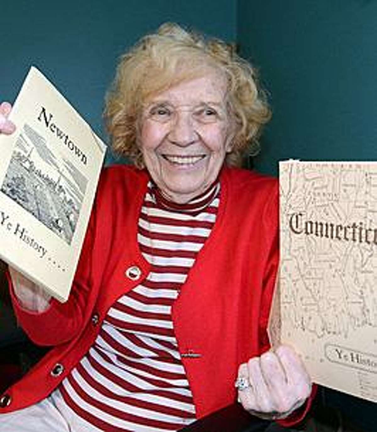 Mae Schmidle, who many called the “spirit of Newtown,” died on Friday, April 26, 2019 at age 92. Along with serving four terms as a state reprsentative, Schmidle was a Newtown’s town clerk and president of the Connecticut State PTA. During her years in the Lesgilature she will be remembered for her advocacy on behalf of the historic flagpole, first erected in 1876 the centennial celebration of the nation’s independence.