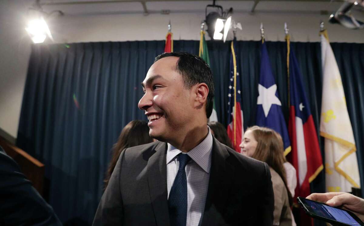 U.S. Rep. Joaquin Castro, D-Texas, center, leaves a news conference with state senators where he addresses a GOP-backed resolution in the Texas Legislature supporting President Donald Trump's declaration of an emergency on the U.S.-Mexico border has reignited an immigration debate in the Capitol, Wednesday, April 17, 2019, in Austin, Texas. (AP Photo/Eric Gay)