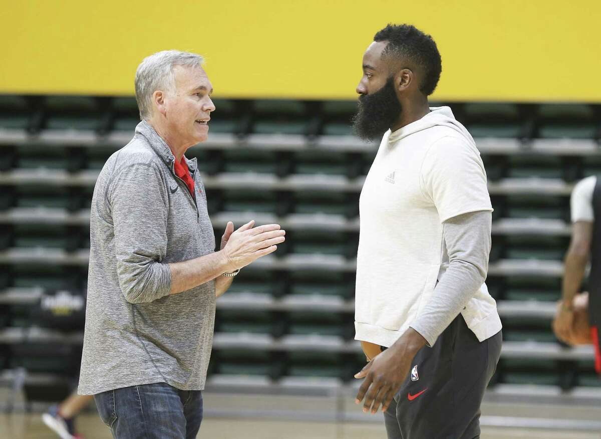 At Monday’s Rockets practice at the University of San Francisco, coach Mike D’Antoni, left, conveyed that he wants James Harden and his teammates to shoot before the 24-second clock winds down to its third and fourth quadrants.