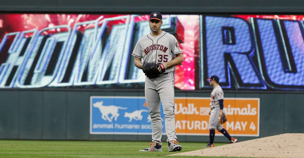 Houston Astros pitcher Justin Verlander (35) reacts after giving up a solo home run to Minnesota Twins' Ehire Adrianza in the third inning of a baseball game Monday, April 29, 2019, in Minneapolis. (AP Photo/Jim Mone)