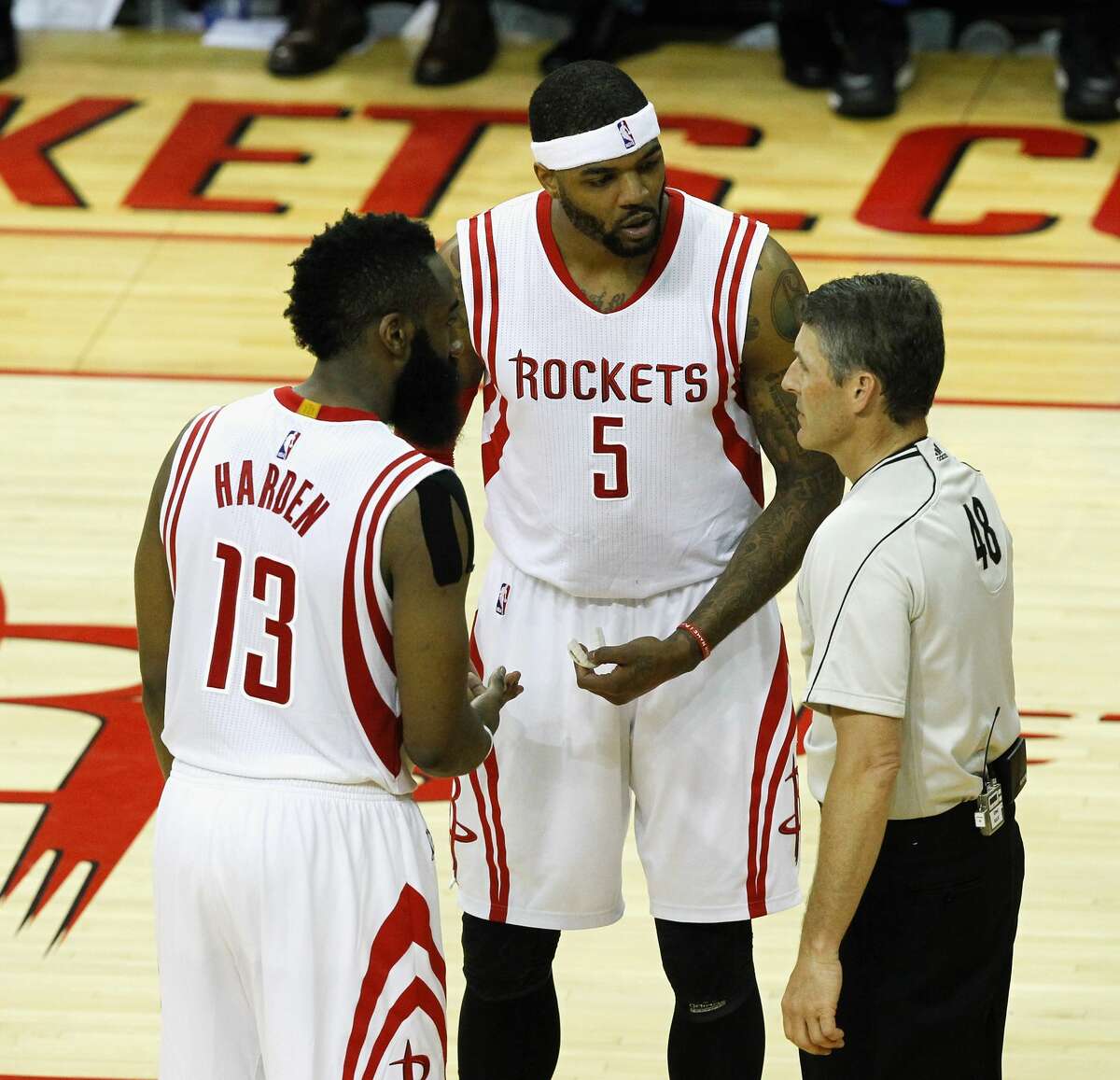 HOUSTON, TX - MAY 23: James Harden #13 of the Houston Rockets and Josh Smith #5 have words with referee Scott Foster during Game Three of the Western Conference Finals at Toyota Center on May 23, 2015 in Houston, Texas. NOTE TO USER: User expressly acknowledges and agrees that, by downloading and/or using this photograph, user is consenting to the terms and conditions of the Getty Images License Agreement. (Photo by Bob Levey/Getty Images)