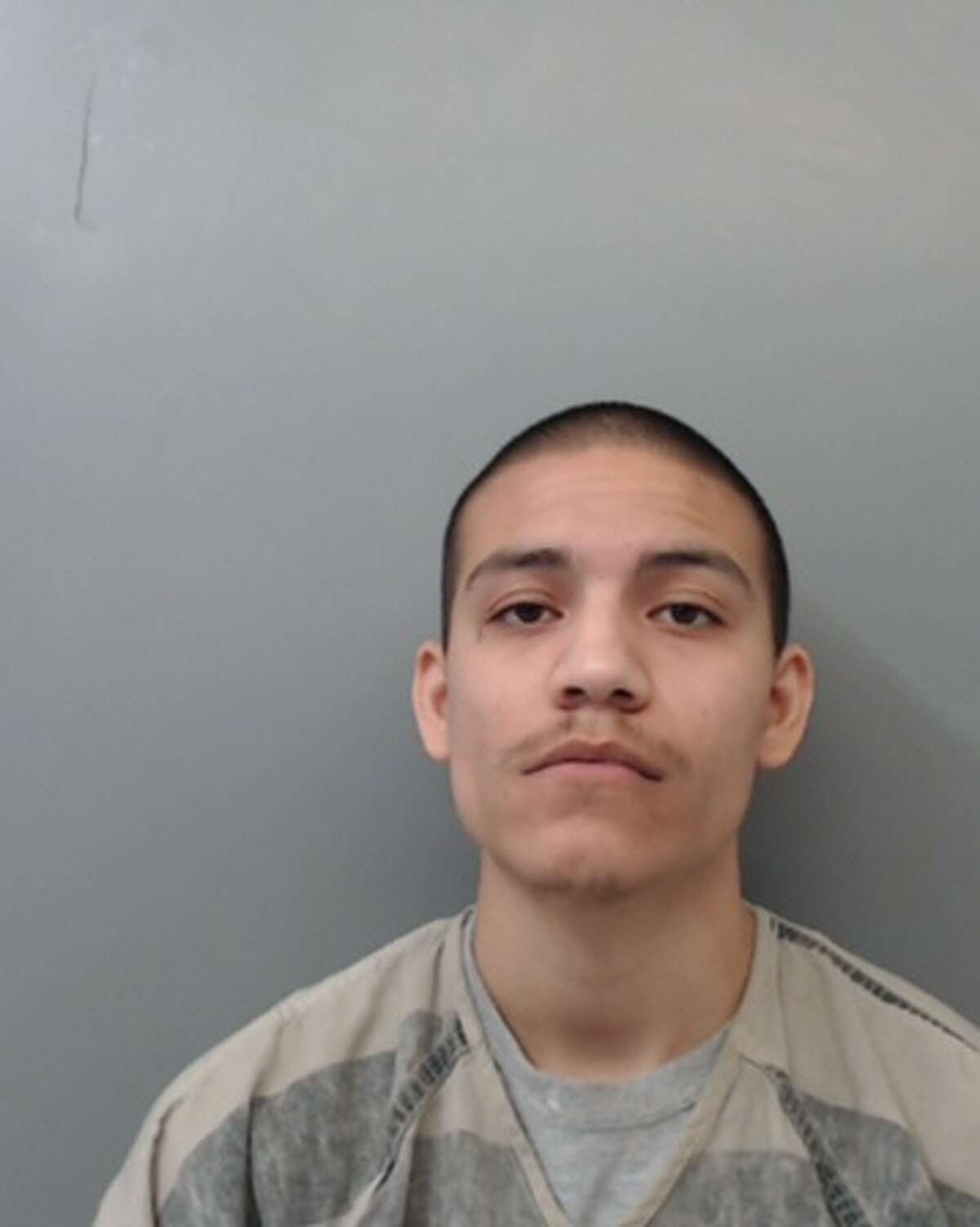 Alberto Martinez, 25, was arrested and charged with assault, family violence.