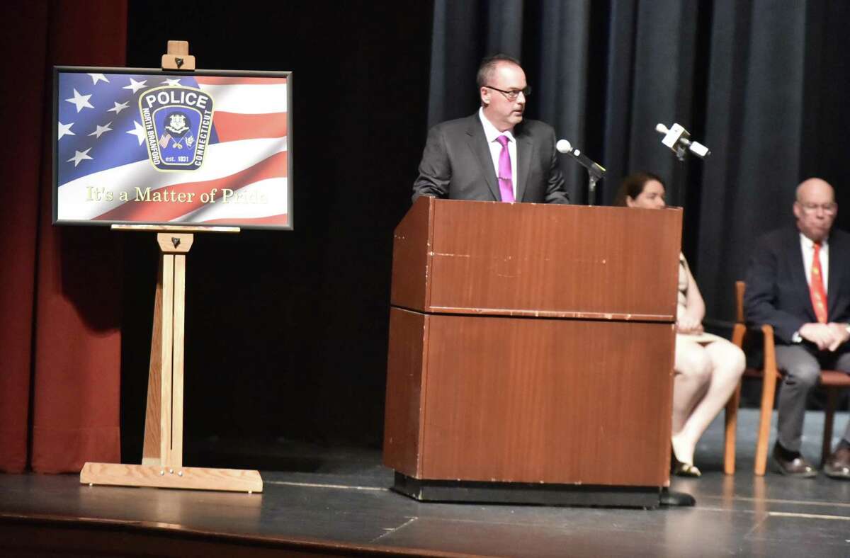The swearing-in ceremony for North Branford Police Chief Kevin Halloran Monday evening at the North Branford Intermediate School Auditorium.