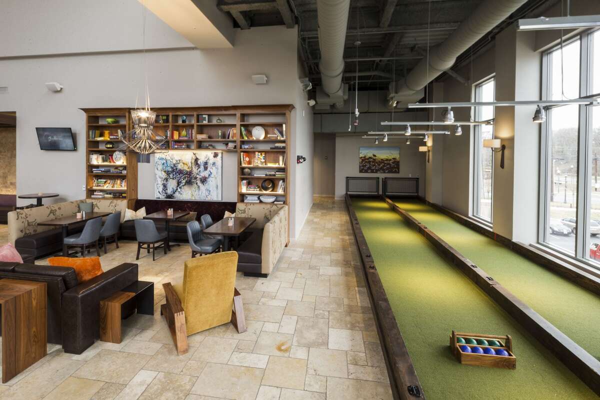 Pinstripes, a dining and entertainment concept that features Italian-American cuisine, bowling and bocce will open this fall at Kirby Collection near River Oaks. Photos from similar locations.