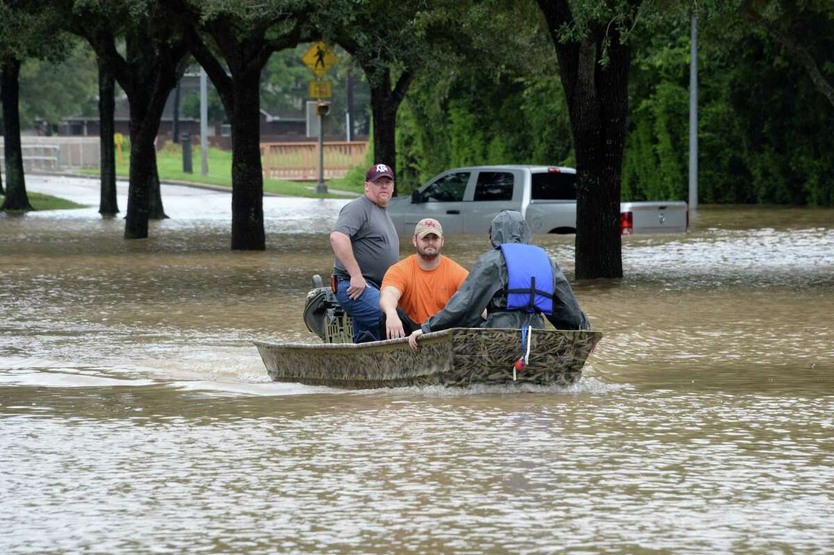 Residents of the Cinco Ranch and Canyon Gate areas of Ft. Bend County evacuate from the west side of the Barker Reservoir along Mason Road in Katy, TX on August 29, 2017.