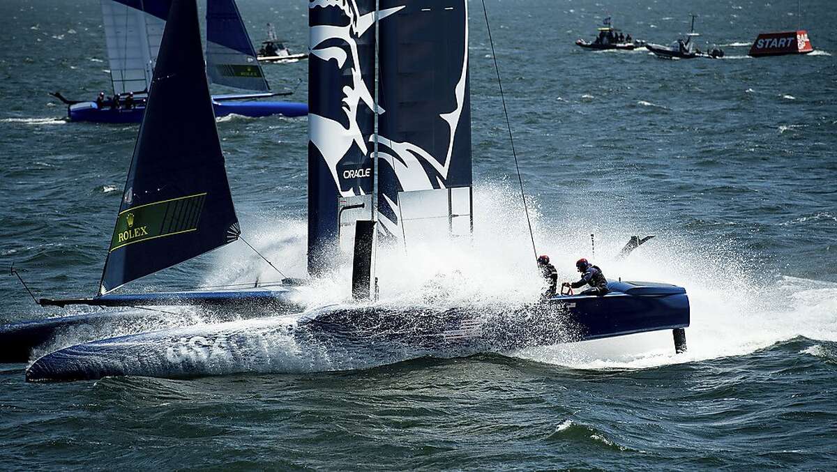 The U.S.A. SailGP team starts a practice race on Tuesday, April 30, 2019, in San Francisco. The SailGP F50 foiling catamarans, which organizers say can reach 60 miles per hour, will compete on the San Francisco Bay May 4-5. (AP Photo/Noah Berger)