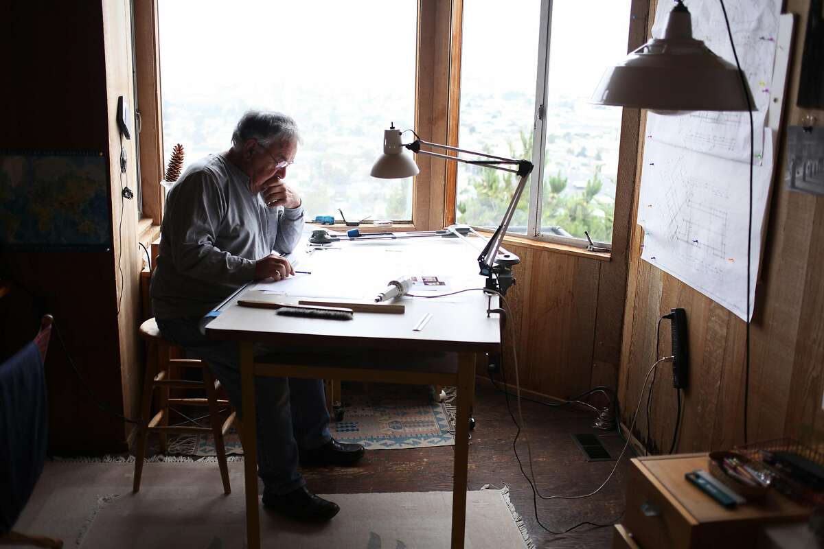 Architect George Homsey, of EHDD, works on a home renovation project for a friend in his home office on August 23, 2013 in the Dolores Heights area of San Francisco, Calif.