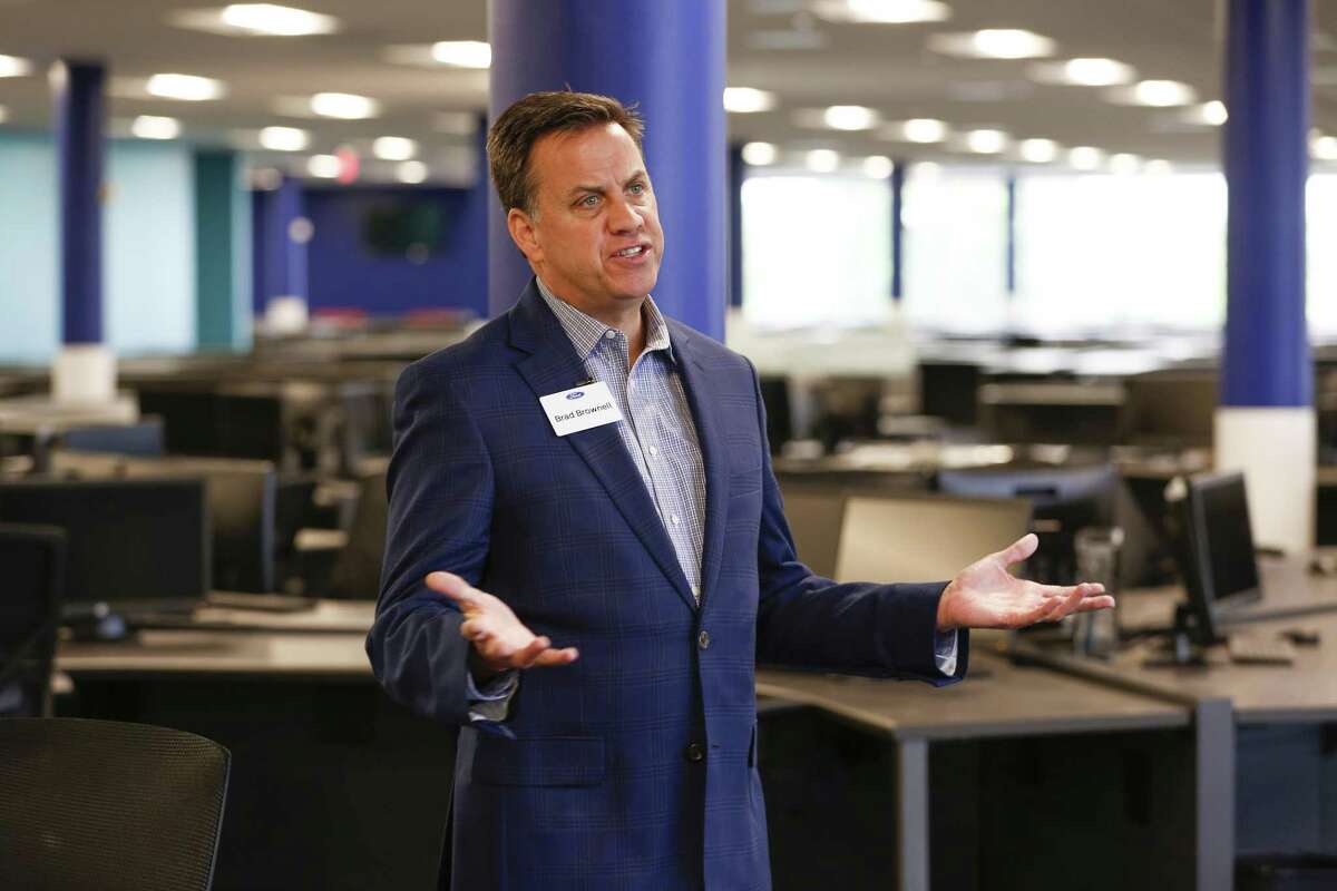 Brad Brownell, director of Ford's global contact centers, talks in their new call center Wednesday, May 1, 2019, in Houston.