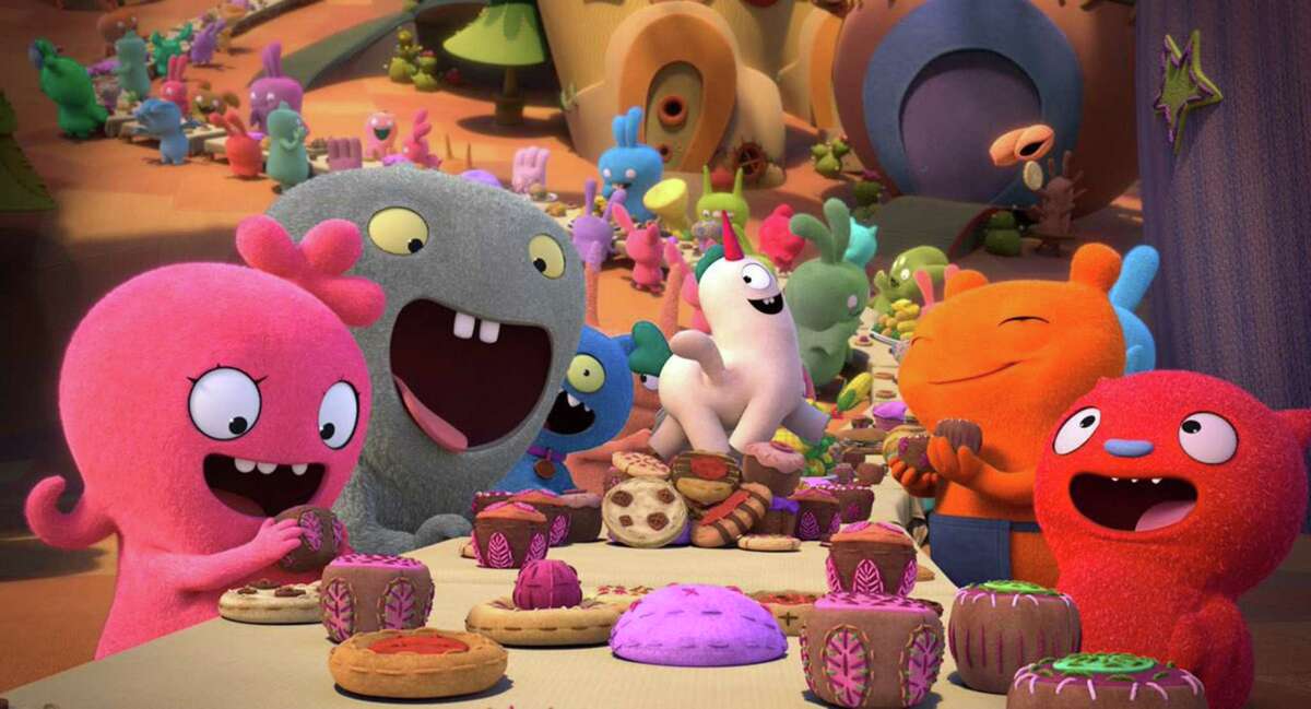 The latest children's toy sent into the movie-transformation merch machine are the colorful, blobby plushies known as Uglydolls, whose adventures feature in the new animated film "UglyDolls." (STX Entertainment/TNS)