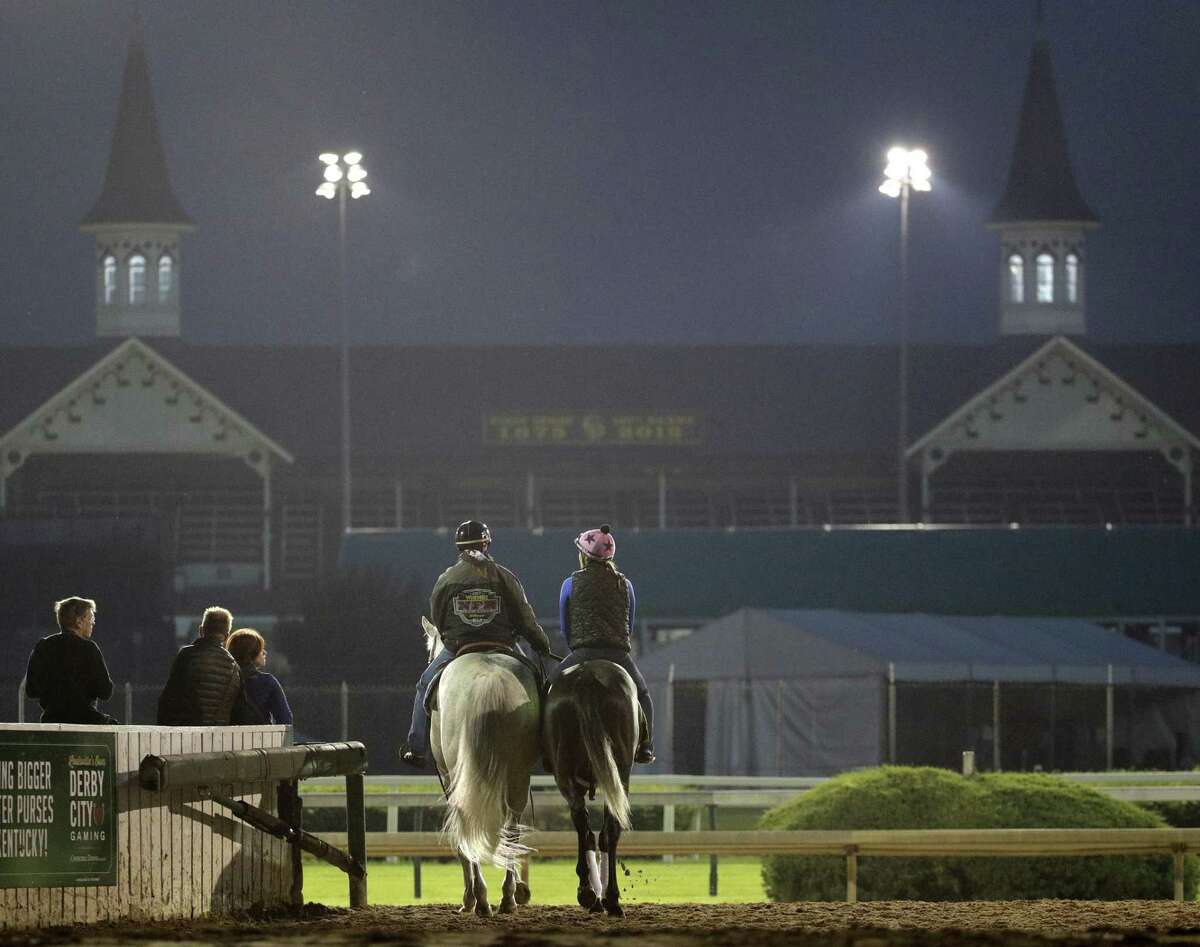 Kentucky Derby hopeful Gray Magician is led onto the track for a workout at Churchill Downs Tuesday, April 30, 2019, in Louisville, Ky. The 145th running of the Kentucky Derby is scheduled for Saturday.