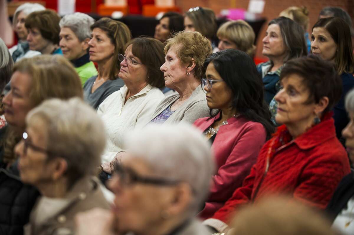 Women listen to presentations from local organizations during a meeting of the Midland 100 Club on Wednesday, May 1, 2019 at Midland Center for the Arts. (Katy Kildee/kkildee@mdn.net)