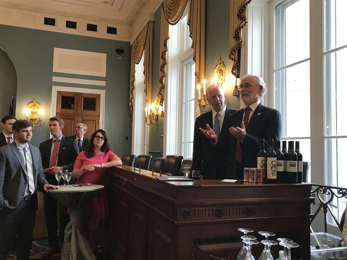 Reps. Mike Thompson, D-St. Helena, and Dan Newhouse, R-Wash., speak at a Congressional Wine Caucus event at the U.S. Capitol. Newhouse recently joined Thompson in co-chairing the caucus.
