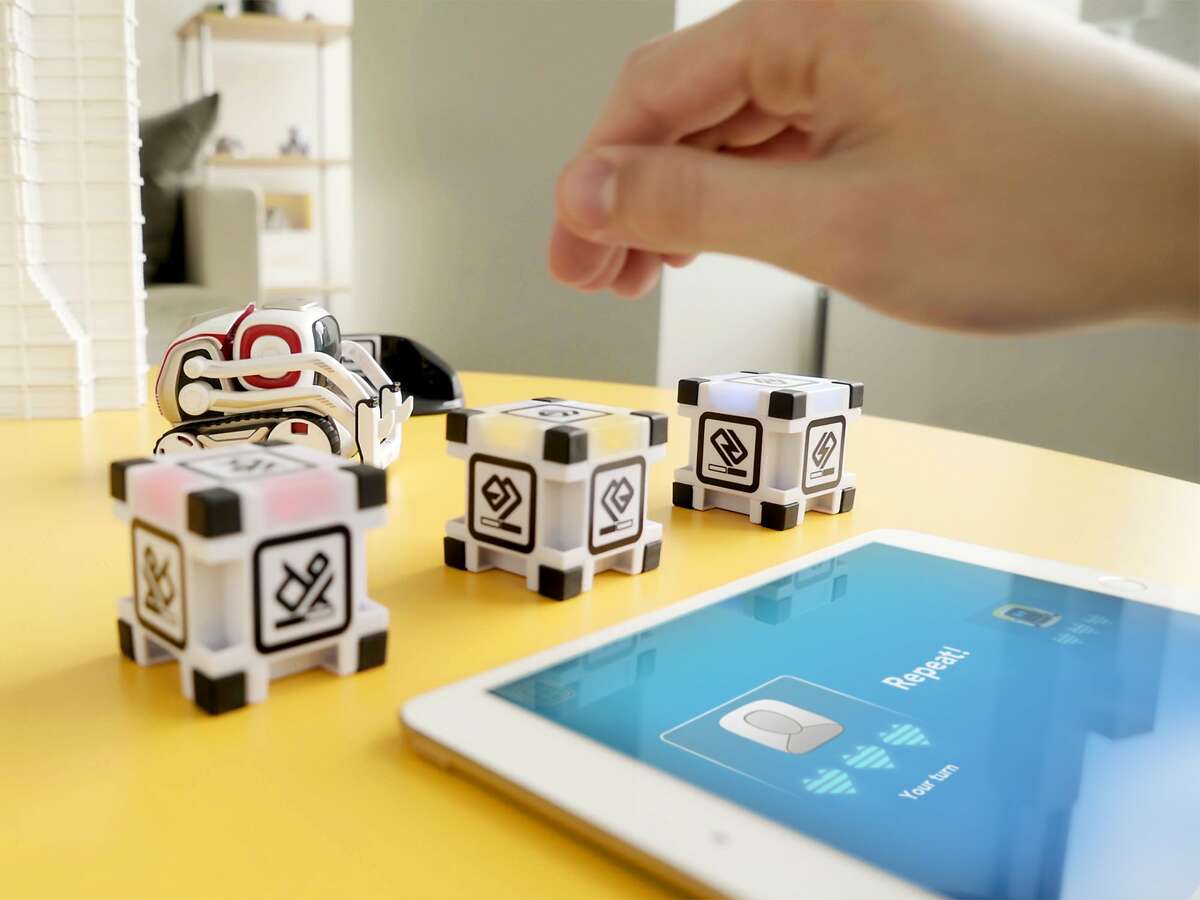 This photo provided by Anki shows the Cozmo Memory Match game. Whether you’re looking for something educational or a toy that’s just for fun, there are a lot of choices for the holidays. New toys include little robot friends full of personality and magnetic blocks that snap together to teach the basics of computer programming. (Anki via AP)