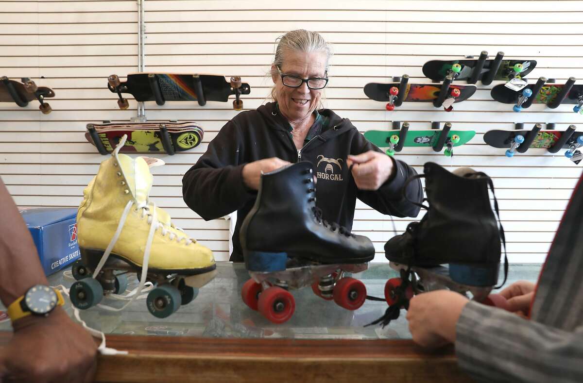 Owner Carol Sloan strings some skates at Skates on Haight on Thursday, April 25, 2019, in San Francisco, Calif. Skates on Haight, a 45-year-old skate shop in the Haight, is looking for a co-tenant to share their space because of the rising cost of rent.