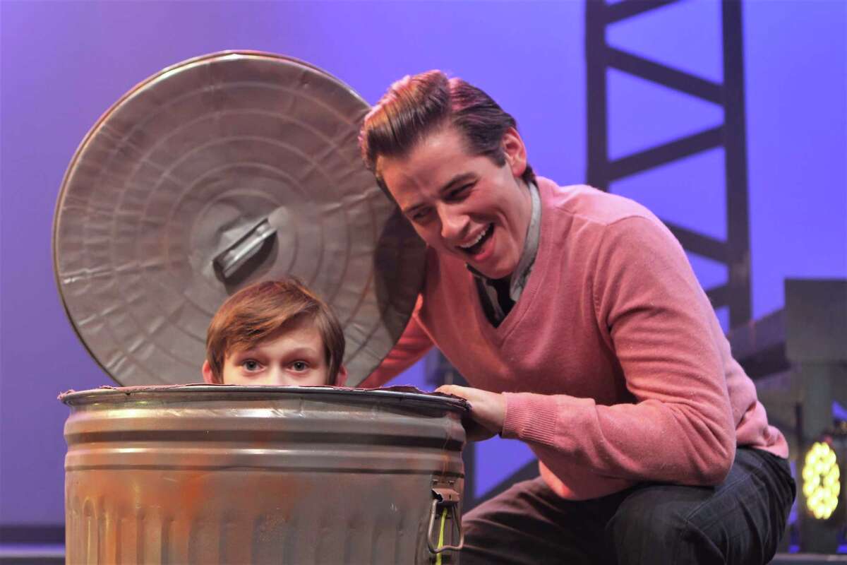 Seven Angels Theatre's production of The Who's "Tommy" continues through May 19. Above, Brendan Harris and Jackson Mattek rehearse a scene.