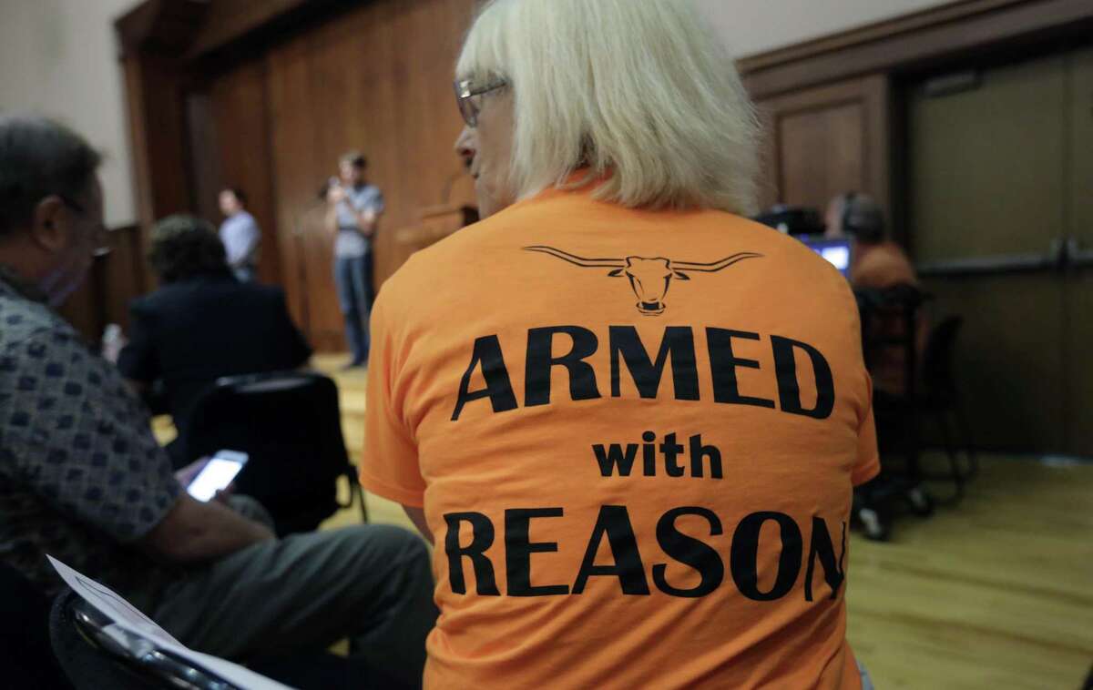Professor Ann Cvetkovich waits to speak during a public forum at the University of Texas campus as a special committee studies how to implement a new law allowing students with concealed weapons permits to carry firearms into class and other campus buildings, Wednesday, Sept. 30, 2015, in Austin, Texas. The law takes effect in August 2016. (AP Photo/Eric Gay)