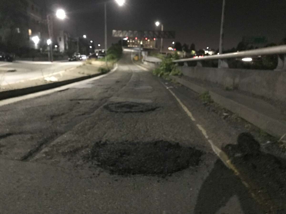 The "Pothole Vigilantes" shared photos of potholes they've patched up in Oakland in recent weeks.