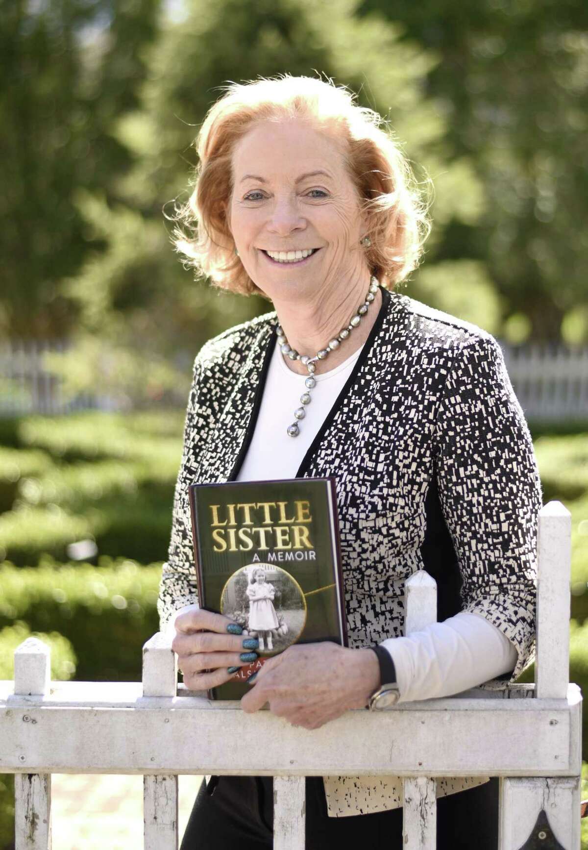Patricia Chadwick, holding a copy of her new memoir "Little Sister," will speak in the Greenwich Library’s Meeting Room at 7 p.m. Monday as part of the AuthorsLive program. Chadwick writes about her childhood living in a cult-like a religious community called the Slaves of the Immaculate Heart of Mary in Cambridge, Mass. After leaving the community at age 18, she had a 30-year career in the investment business, culminating as a Global Partner at Invesco. The free event is open to the public. Registration is recommended at www.greenwichlibrary.org.