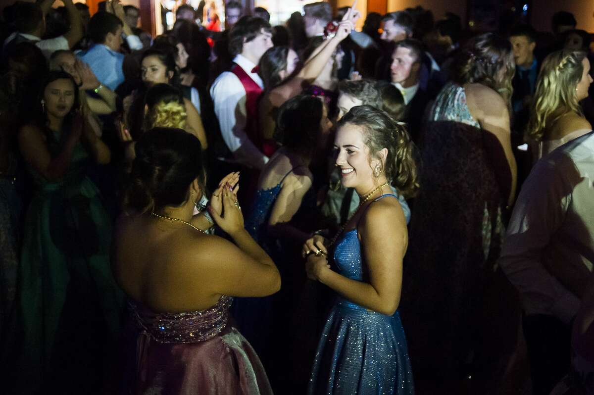 Freeland High School students enjoy their prom at the Great Hall Banquet & Convention Center on Friday, May 3, 2019. (Katy Kildee/kkildee@mdn.net)