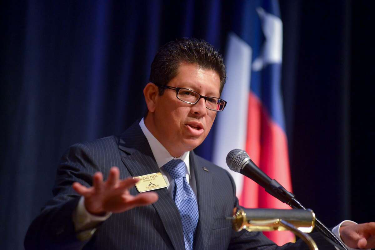Richard Perez, President and CEO of the Greater San Antonio Chamber of Commerce speaks to a luncheon of chamber members at the Omni Colonnade in August 2013.