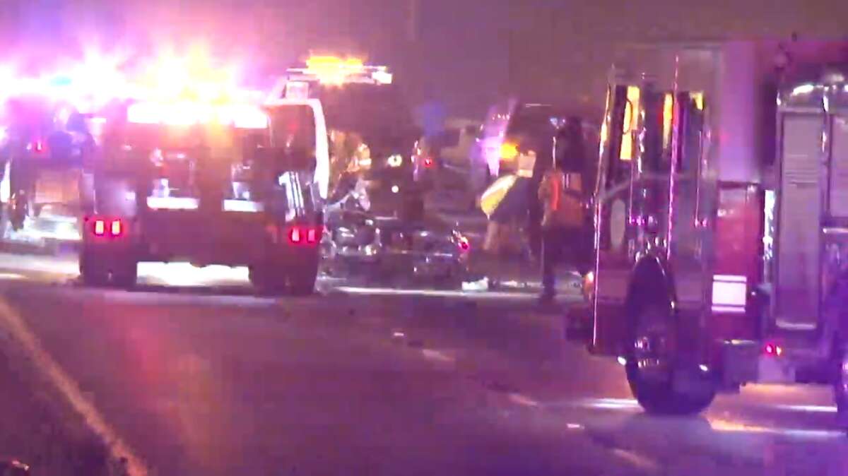 A screenshot of Metro Video footage of a major vehicle crash near South Post Oak Road and South Main Street in Houston, Texas. Around midnight Saturday, several cars spun out of control near the intersection. One motorcyclist was reported to be in critical condition after the crash.
