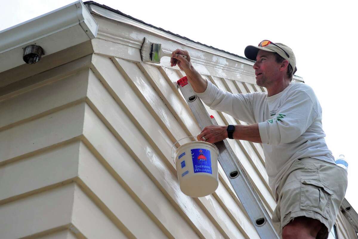 Volunteers make home repairs during HomeFront Day