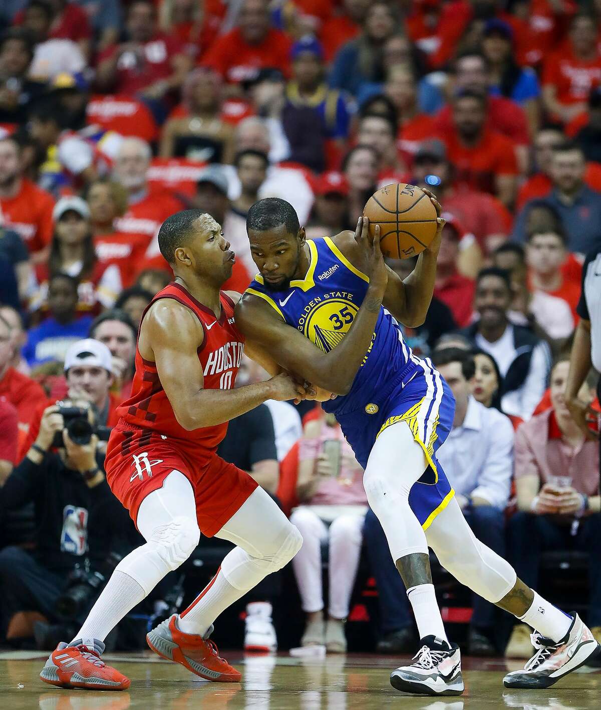 Golden State Warriors forward Kevin Durant, right, hugs teammate Stephen  Curry, left, after they defeated the Houston Rockets in Game 7 of the NBA  basketball Western Conference finals, Monday, May …