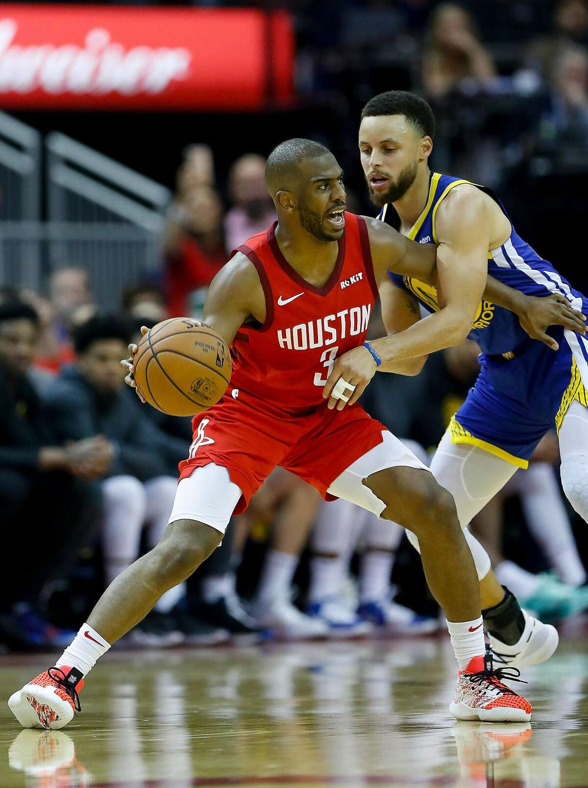 FILE PHOTO: Houston Rockets guard Chris Paul (3) is defended by Golden State Warriors guard Stephen Curry (30) during the third quarter of Game 3 of a NBA Western Conference semifinal playoff game at Toyota Center, in Houston , Saturday, May 4, 2019.