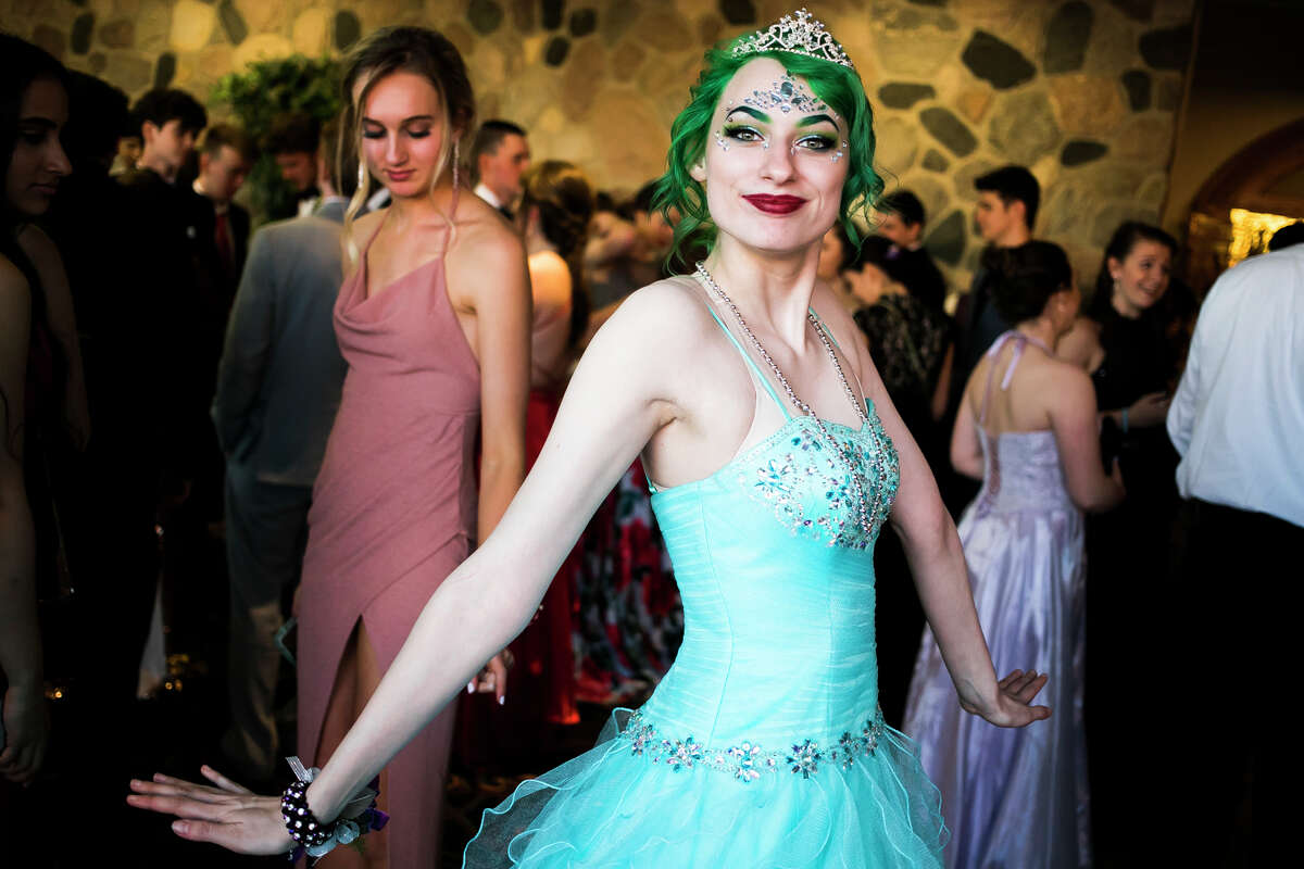 Midland senior Alayna Dewey wears a tiara during the Midland High and Dow High combined prom on Saturday, May 4, 2019 at the Great Hall Banquet & Convention Center in Midland. (Katy Kildee/kkildee@mdn.net)