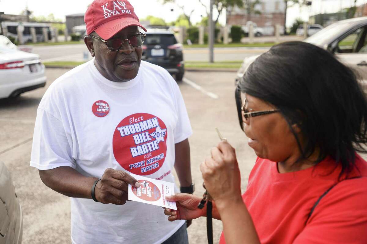 Port Arthur Mayoral candidate Thurman Bill Bartie talks to a voter outside Port Arthur city hall Saturday afternoon. Photo taken on Saturday, 05/04/19. Ryan Welch/The Enterprise