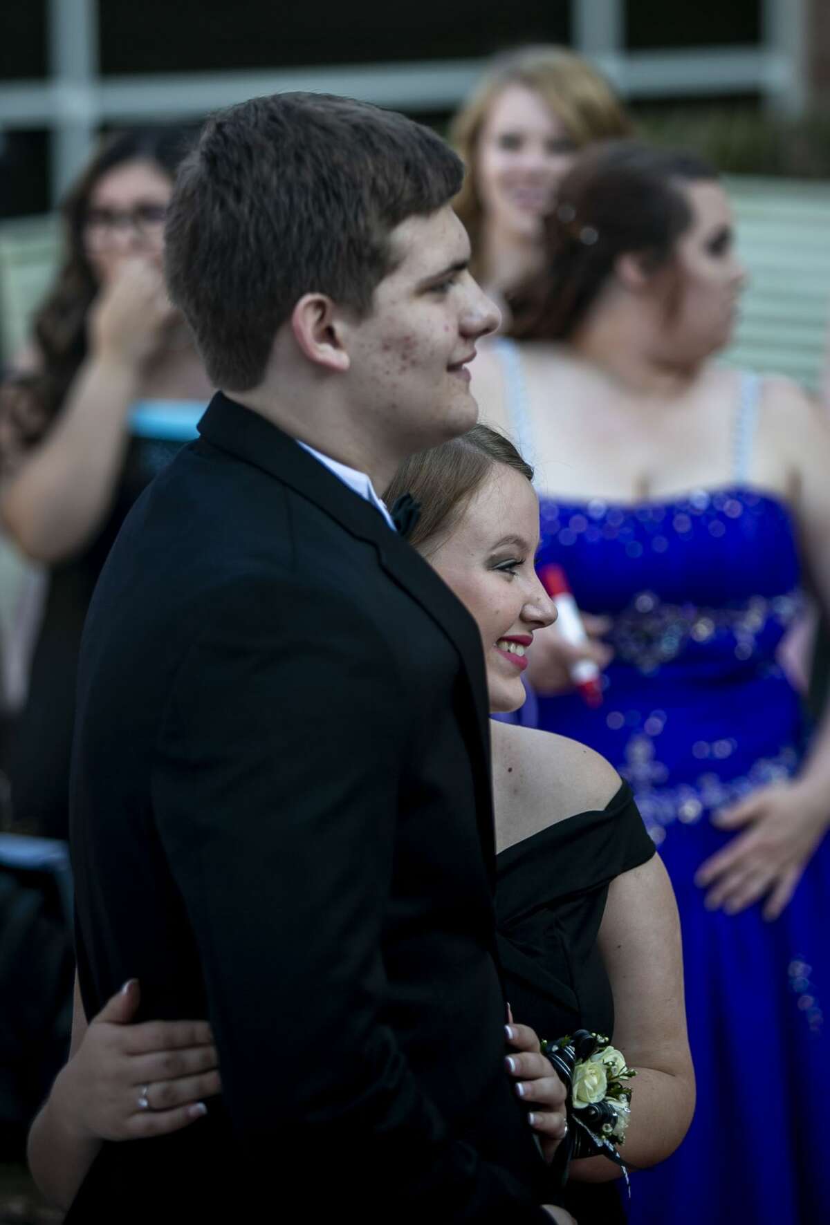 Beau Mayberry, 16, poses with his date Ahlivia Hodges, 17, both of Beaverton, during the Beaverton High School prom held at The H Hotel in downtown Midland on Saturday, May 4, 2019. (Josie Norris/for the Daily News)