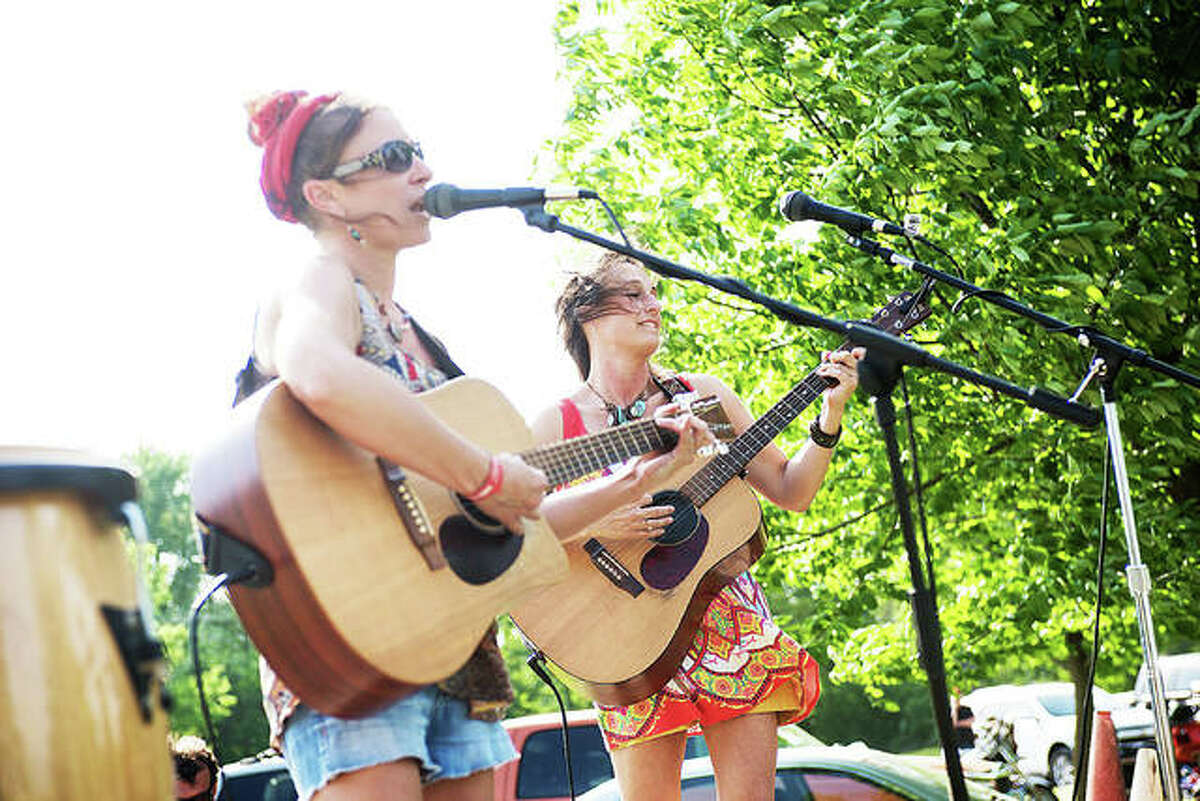 Sarah Springman-Shewmake, left, and Sara McGibany, right, play as the Set break Sarahs at last year’s Trinity River Festival in Cottage Hills. Both women return to this year’s festival as part of the band The Dead Roses.