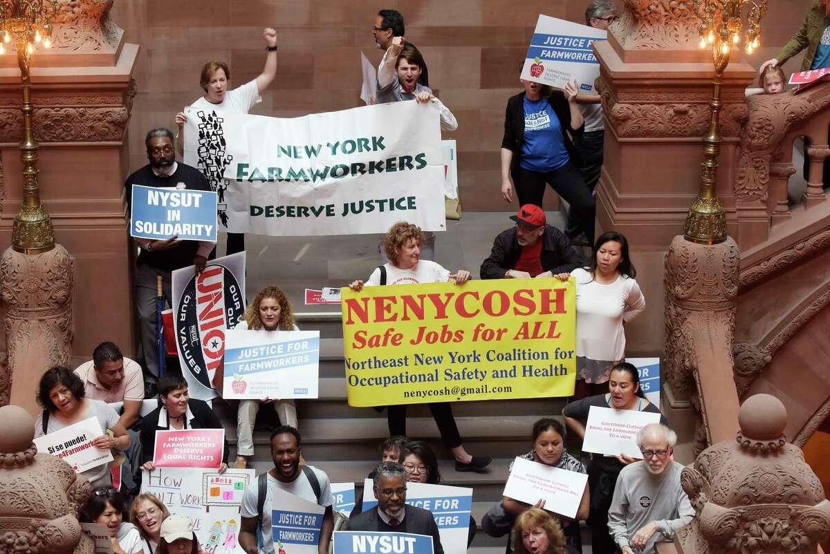 Groups calling on the legislature to pass the Farmworker Fair Labor Practices Act hold a rally inside the Capitol on Tuesday, May 15, 2018, in Albany, N.Y. (Paul Buckowski/Times Union)