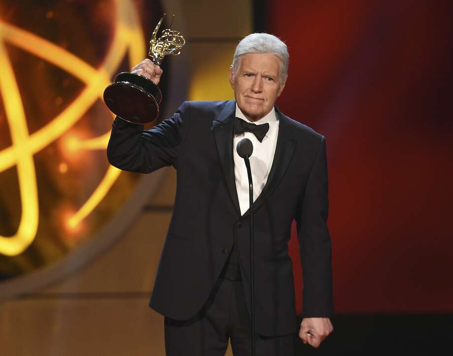 Alex Trebek accepts the award for the best game show host for 