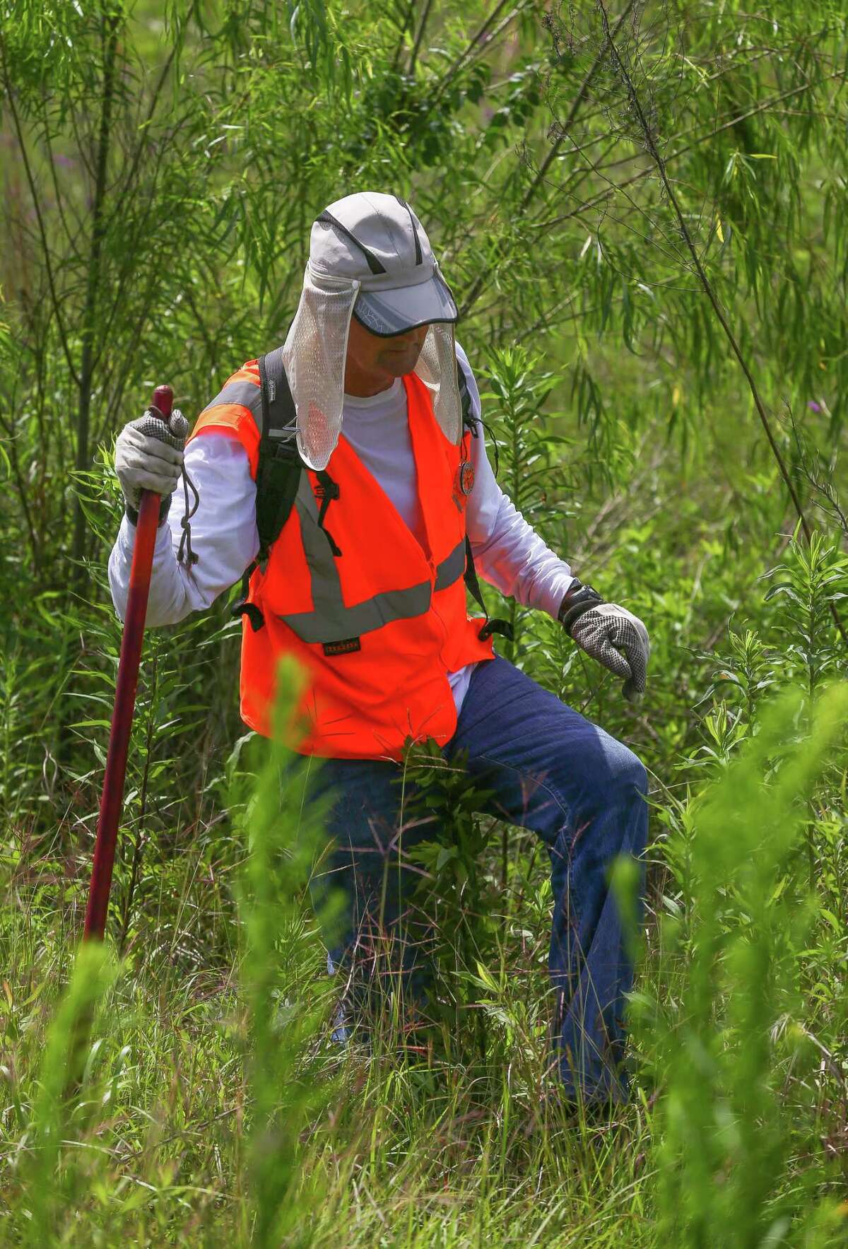 Jim Reynolds, with Texas EquuSearch, conducts a search for four-year-old Maleah Davis Monday, May 6, 2019, in Humble, Texas.