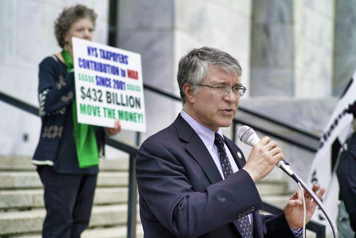 Assemblymember Phil Steck addresses those gathered on the steps of the Legislative Office Building for a rally put on by Women Against War on Monday, May 6, 2019, in Albany, N.Y. (Paul Buckowski/Times Union)