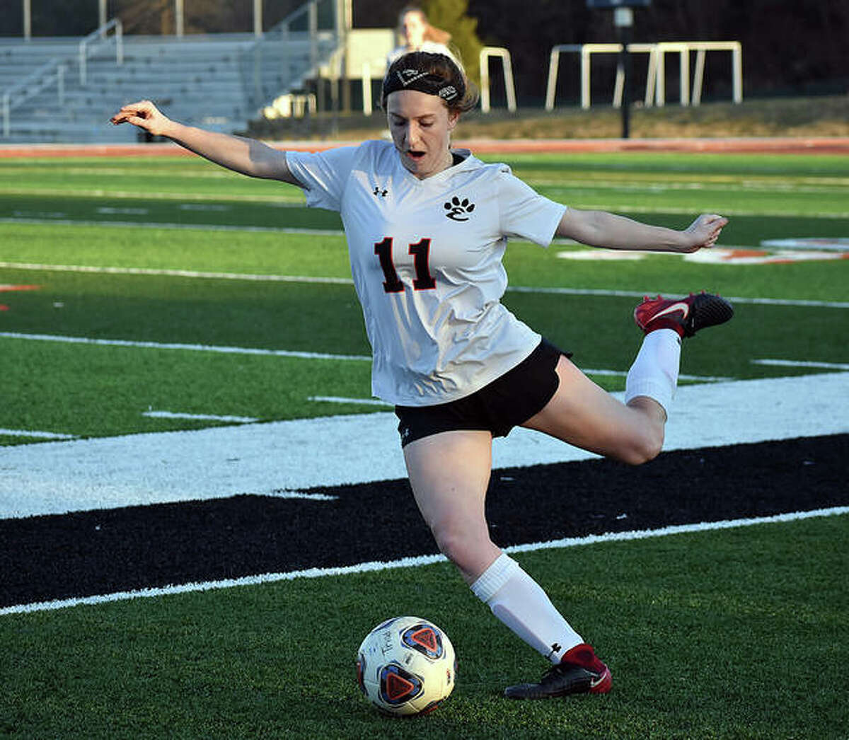 Edwardsville’s Emma Hensley blasts the ball down the field.