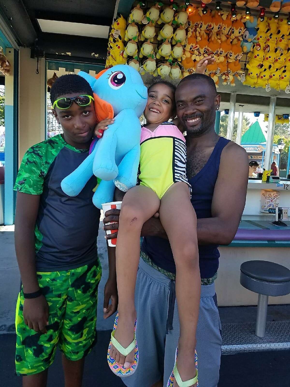 Ronell Foster, right, seen in this undated photo with his two children. Foster was fatally shot by a Vallejo police officer in February 2018. On Monday, the City of Vallejo released body camera video of Foster's death.