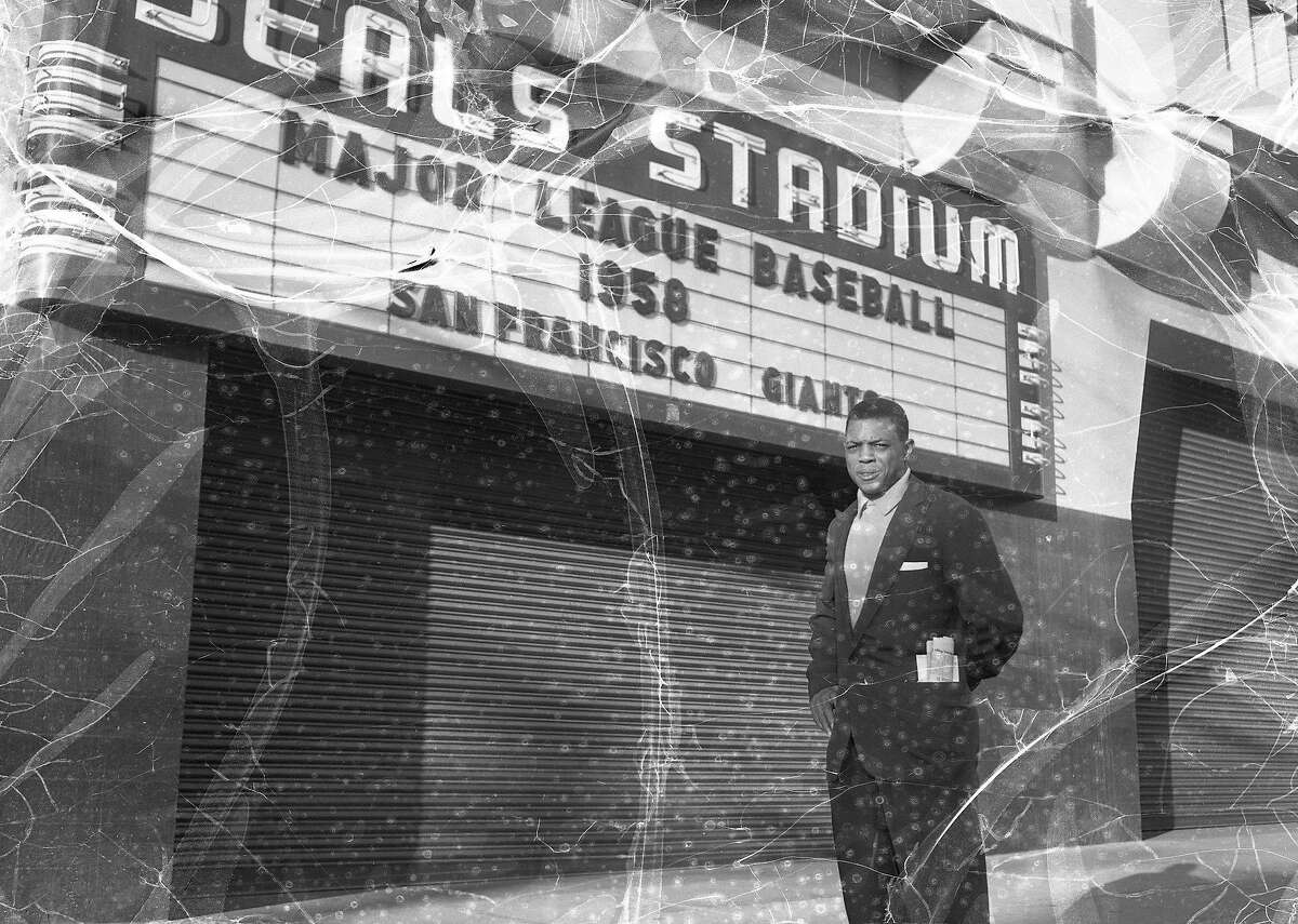 Willie Mays poses in front of Seals Stadium during an October 31, 1957 photo shoot, the year before the outfielder made his debut as a San Francisco Giant.