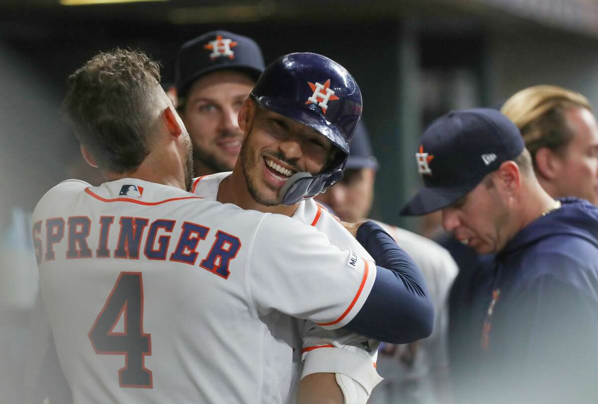 PHOTOS: 2019 Astros game-by-game  Houston Astros shortstop Carlos Correa (1) celebrates with Houston Astros center fielder George Springer (4) after scoring a home-run during the 2nd inning of an MLB baseball game at Minute Maid Park Monday, May 6, 2019, in Houston. >>>See how the Astros have fared so far this season ... 