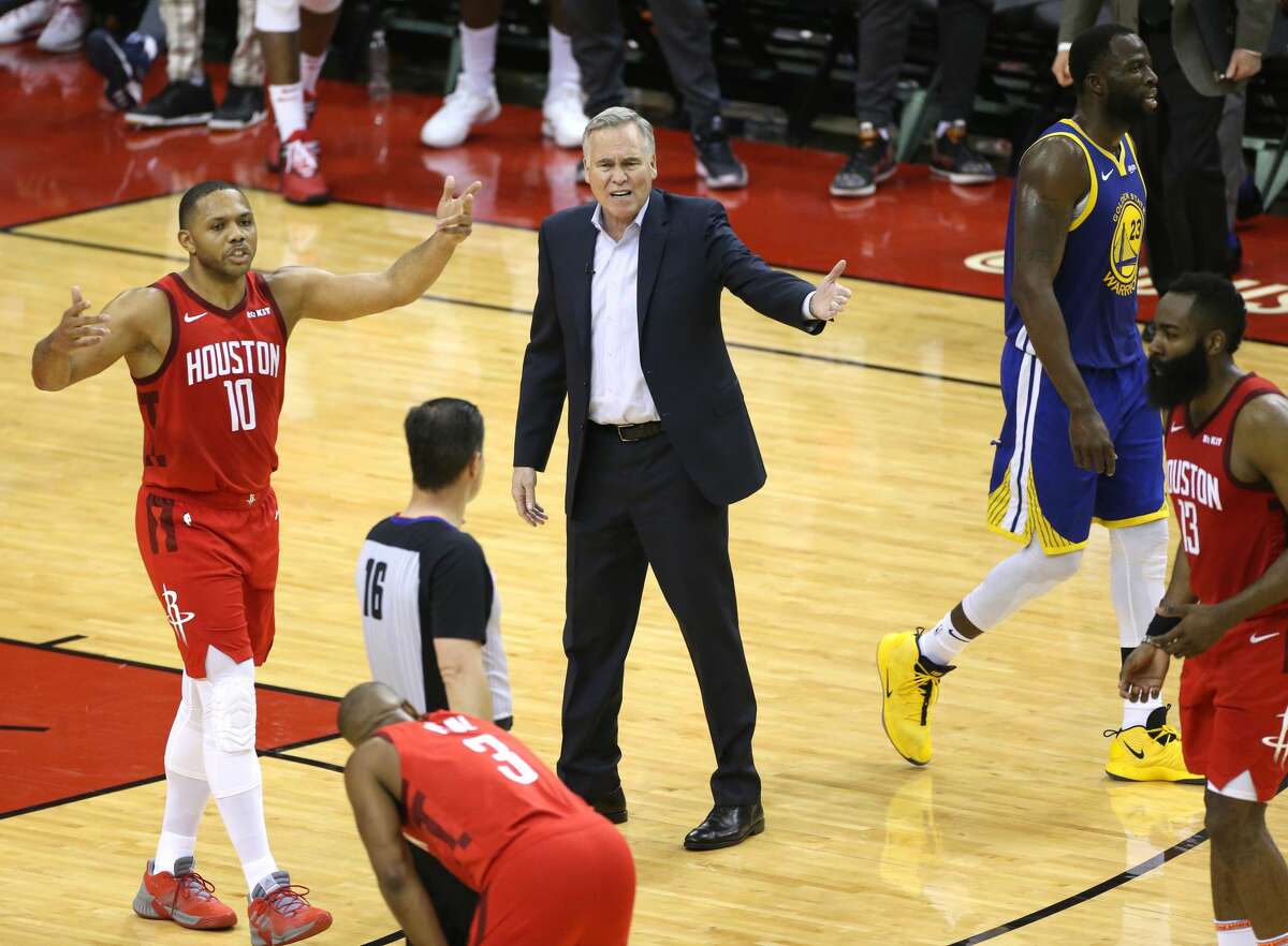 Houston Rockets head coach Mike D'Antoni and Rockets guard Eric Gordon (10) argues a call with referee David Guthrie (16) during the second half of Game 4 of the NBA Western Conference semifinals against the Golden State Warriors at Toyota Center on Tuesday, May 7, 2019, in Houston.
