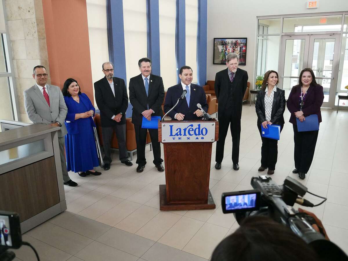 Congressman Henry Cuellar, at podium, was joined by Kim Tolar, Acting Deputy Regional Administrator for the Federal Aviation Administration, third from right, and City and airport officials at a press conference Monday, where Cuellar announced recent and upcoming improvements to the Control Tower at the Laredo International Airport.