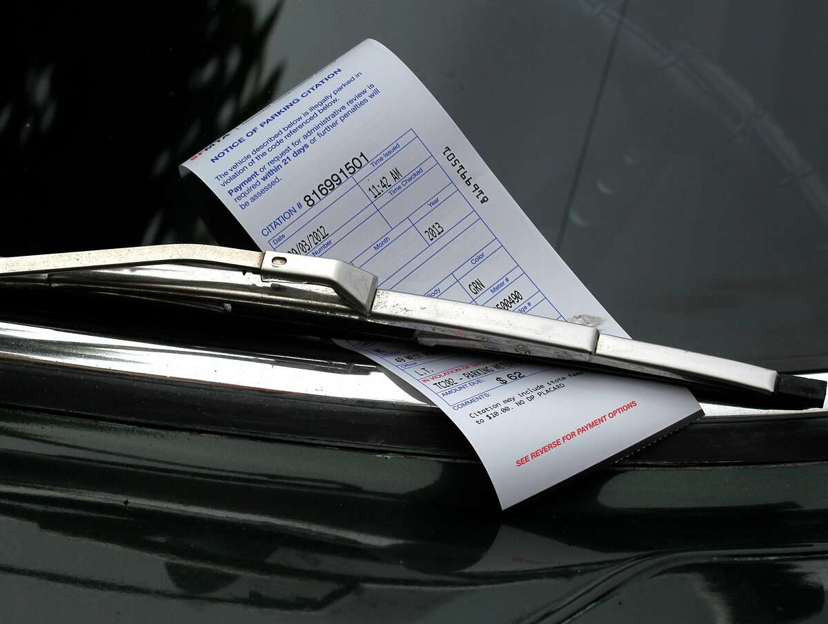 A $62 parking ticket is left for the driver of a car parked at an expired meter on West Portal Avenue in San Francisco, Calif. on Monday, Sept. 3, 2012. Officers were issuing parking violations city-wide during the Labor Day holiday.