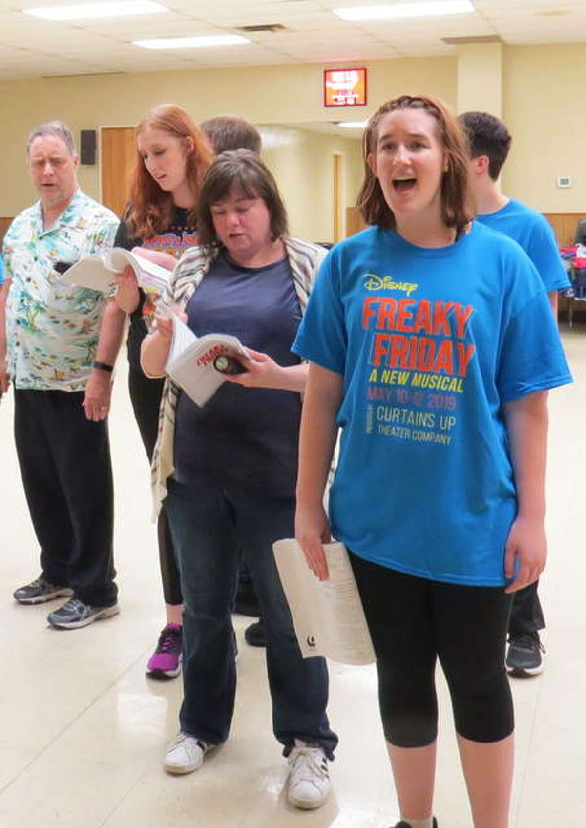 The cast of Freaky Friday rehearses one of the musical numbers. The show opens Friday, May 10 at SIUE’s Dunham Theater.