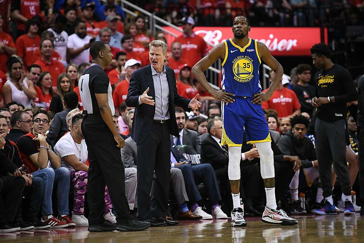 Golden State Warriors head coach Steve Kerr shows his frustration over a foul called on Golden State Warriors guard Klay Thompson (11) in the second half during game 3 of the NBA Western Conference Semifinals between the Golden State Warriors and Houston Rockets at the Toyota Center in Houston, Texas, on Saturday, May 4, 2019.