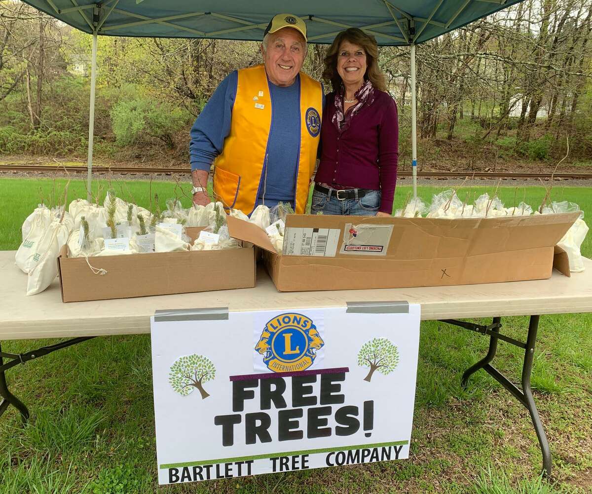 The New Milford Lions Club recently gave away 90 free trees for Arbor Day. Representatives from the Lions Club, including Lion Frank Cavielro and president Tammy Deak, were on hand at Harrybrooke Park to give residents the trees. Ninety trees - chosen in recognition of the club's 90th anniversary this year - were donated by Bartlett Tree Experts.